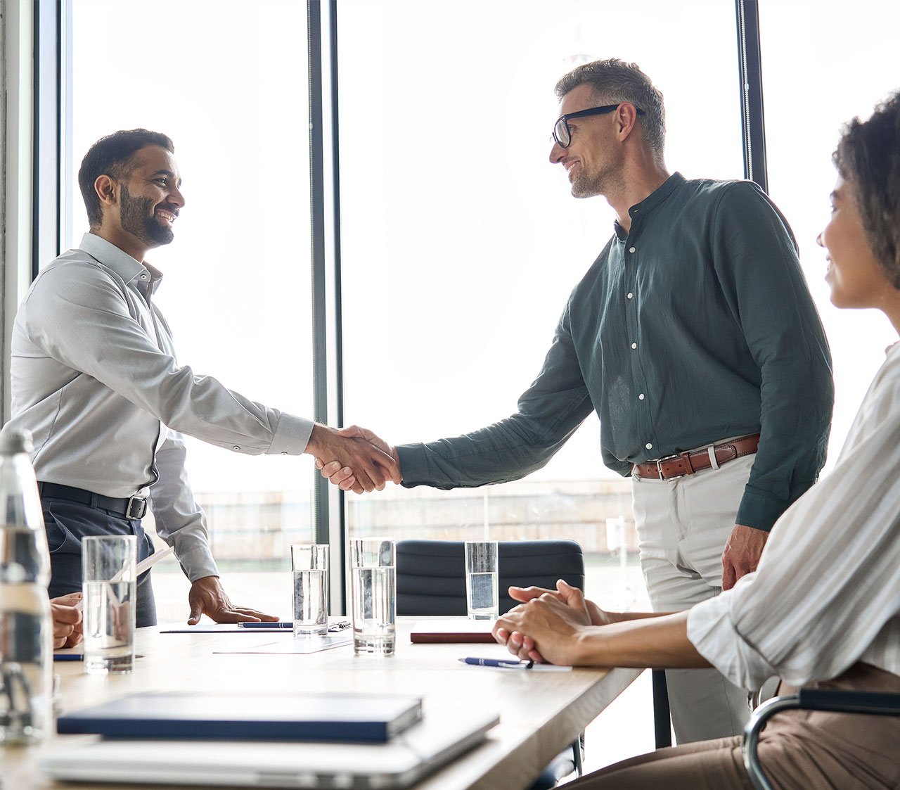 SM Law Group attorneys working with a client